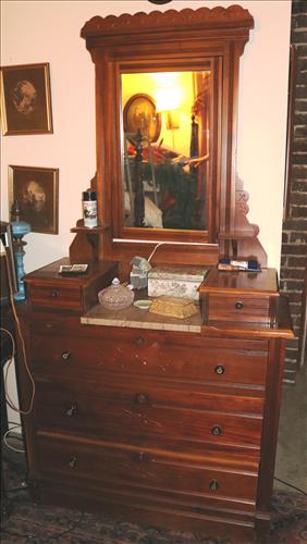 Walnut Eastlake dresser with brown marble: Walnut Eastlake dresser with brown marble insert and glove boxes, 74 in. T, 39 in. W, 16 in. D.