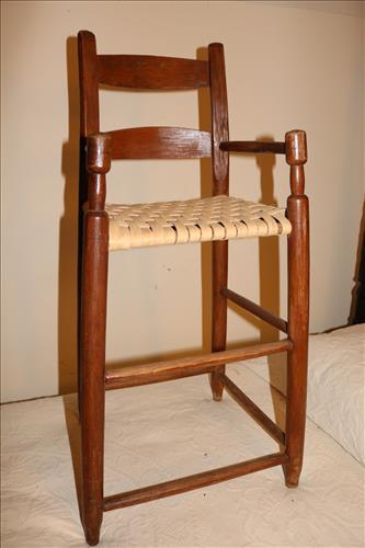 Antique cane bottom primitive child's chair: Antique cane bottom primitive child's high chair