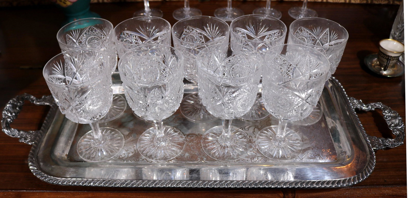 10 piece brilliant cut glass wine glasses, tray: 10 piece brilliant cut glass wine glasses and double handle silver-plate tray, 6 in. T.