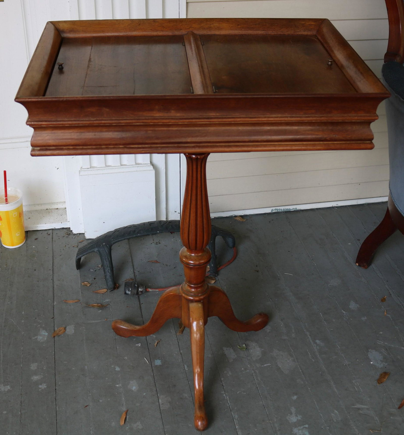 Mahogany 3 leg sewing table w contents: Mahogany 3 leg sewing table with 2 compartments and contents, 37.5 in. T, 24 in. W, 17 in. D.