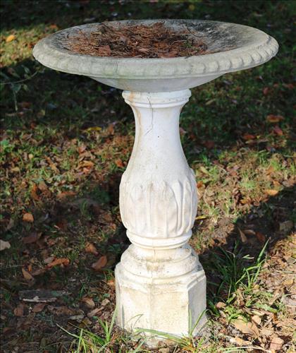 Concrete bird bath, 29 in. T, 22 in. R.: Concrete bird bath, 29 in. T, 22 in. R.