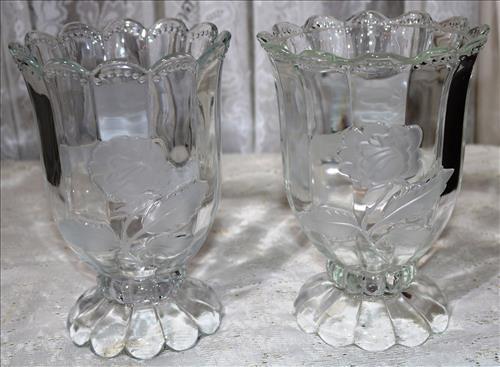Pair of crystal flower vases w embossed flowers: Pair of crystal flower vases with embossed flowers, 9 in. T, 6.5 in. Dia.