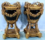 Pair heavy bronze mounted urns w porcelain bowls