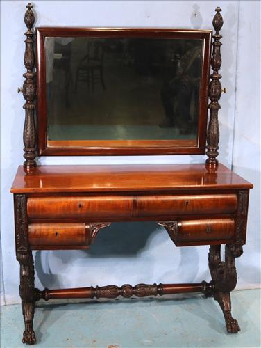 Mahogany Empire dressing table with mirror: Acanthus carved mahogany Empire dressing table with mirror, yolk support base and claw feet, 67 in. T, 46 in. W, 20.5 in. D.