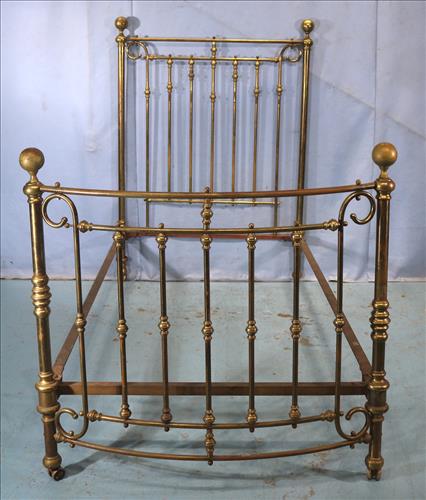 Half size early brass bed with original iron rails: Half size early brass bed with original iron rails, 60 in. T, 42 in. W, 79 in. L.