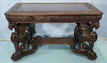 Mahogany partners desk with carved wing griffins