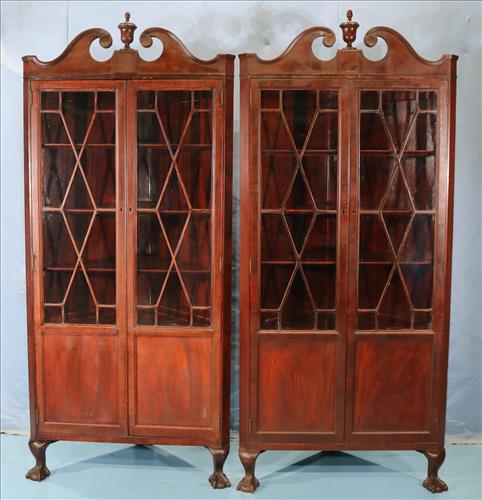 Pair mahogany Chippendale corner cabinets: Pair mahogany Chippendale style corner cabinets with ball and claw feet and doors with individual glass panes, 84 in. T, 37 in. W, 21 in. D, ca. 1900