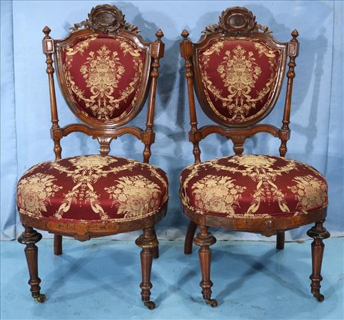 Pair of rosewood parlor side chairs: Pair of rosewood parlor side chairs with carved crown, attrib. to John Jelliff, 40 in. T, 21 in. W, 20 in. D.
