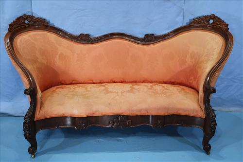 Rosewood rococo parlor sofa with carving: Rosewood rococo parlor sofa with beautiful carving and serpentine ends, Matches no. 123, 39 in . T, 73 in. L, 20 in. D.