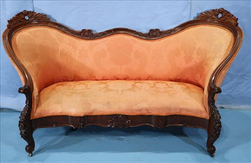 Rosewood rococo parlor sofa with carving: Rosewood rococo parlor sofa with beautiful carving and serpentine ends, Matches no. 122, 39 in . T, 73 in. L, 20 in. D.