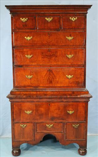 Two piece period mahogany highboy chest: Two piece period mahogany highboy chest with bun feet, 75 in. T, 42 in. W, 25.5 in. D.