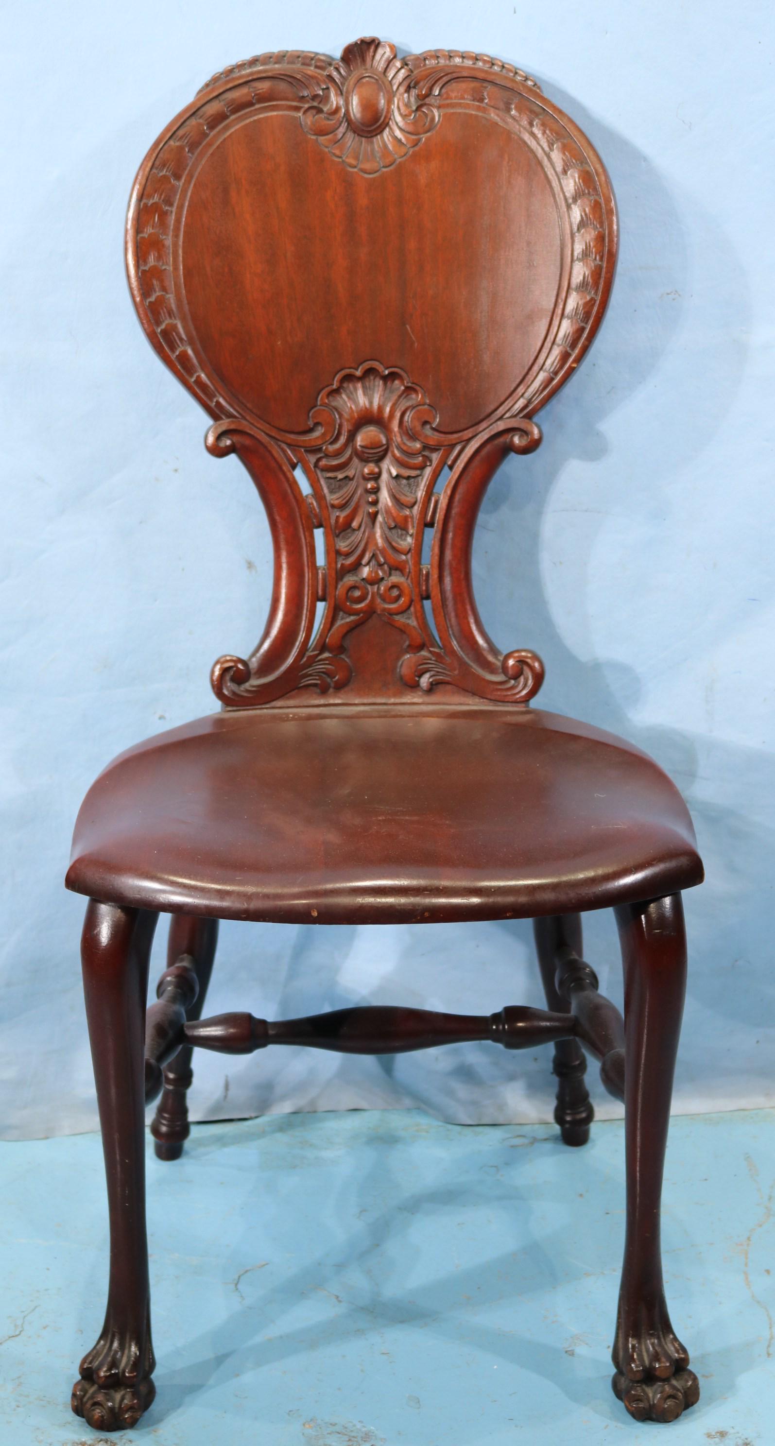 Mahogany Stickley carved back hall chair: Mahogany Stickley and Brandt carved back hall chair, 37.5 in. T, 17.5 in. W, 17 in. D.