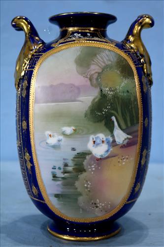 Double handle scenic vase with swans, 9 in. T.: 2 vases, Double handle scenic vase with swans and cobalt blue painted Nippon vase, 9 in. T, 6 in. W.