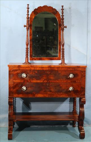 Mahogany empire dressing table: Mahogany empire dressing table with scroll legs and mirror, 66.5 in. T, 32 in. W, 19.5 in. D.