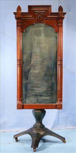 Mercantile store dressing mirror with iron base: Mercantile store dressing mirror with iron base, 70 in. T, 25 in. W.