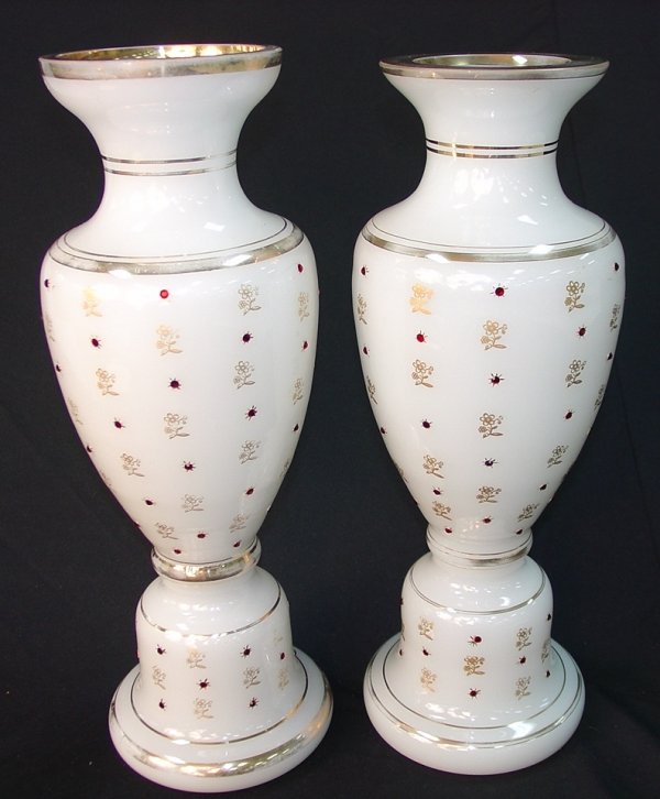 Pair English Jeweled Alabaster Glass Vases: Pair of Matching White English Jeweled Alabaster Glass Vases with Gold Banding and Red Cut Glass Jewels in Starburst Pattern, 18 in. T. X 6 in. Dia.