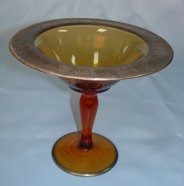 Amber Compot w/ Sterling Silver Overlay: Amber Compot with Sterling Silver Overlay Marked "Copyrighted D" 7 inches T. X 8 inches Dia.