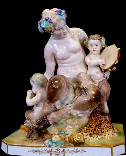 Early Meissen mother Satyr with her fauns,: Early Meissen mother Satyr with her fauns, beneath them is a lephord pelt, 11 in. T, 9 in. W.