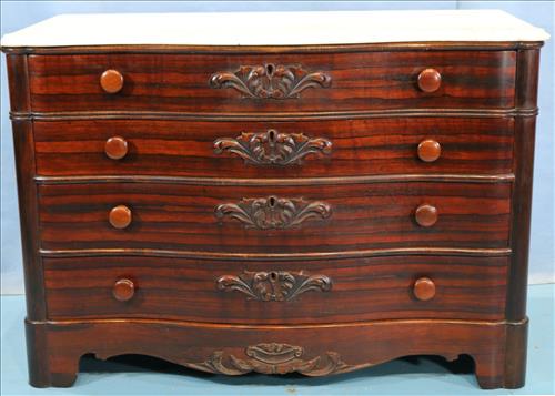 Rosewood 4 drawer serpentine chest with marble: Rosewood 4 drawer serpentine chest with marble top, 33 in. T, 47 in. W, 22 in. D.