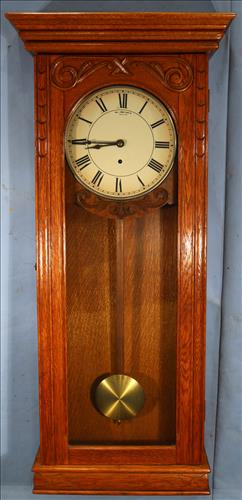 Antique Gilbert wall clock with oak case, 43 in. T. (1 of 4)