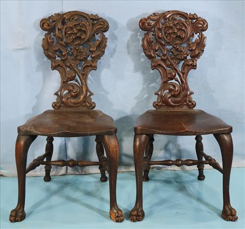 Pair of oak heavily carved hall chairs with griffins (1 of 5)