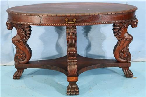Oval oak  library table with winged griffin supports (1 of 5)
