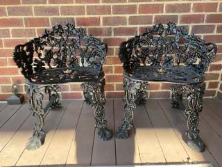 2 small cast iron chairs, 26 in. T, 20 in. W, 12 in. D. (1 of 1)
