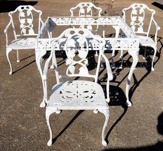 Very heavy cast iron garden set, table and 4 chairs: Very heavy cast iron garden set, glass top table and 4 chairs, signed Atlanta Stove Works, 29 in. T, 36.5 in. W, 36.5 in. D.