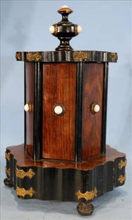Rosewood revolving cigar box with turn top and doors: Rosewood revolving cigar box with mechanical turn top and opening doors, 11 in. T, 5 in. Dia.
