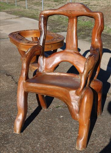 Arm chair made from teakwood roots: Arm chair made from teakwood roots, 45 in. T, 27 in. W, 15 in. D.