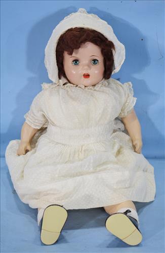 Composition doll has her own hair, ca. 1940 (1 of 5)