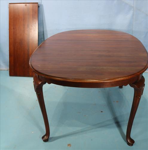 Cherry queen Anne dining table with 1 leaf: Cherry queen Anne dining table with 1 leaf, 29 in. T, 85 in. L, 44 in. W.