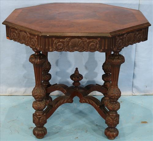Heavily carved octagon center table, 34.5 in. W. (1 of 3)