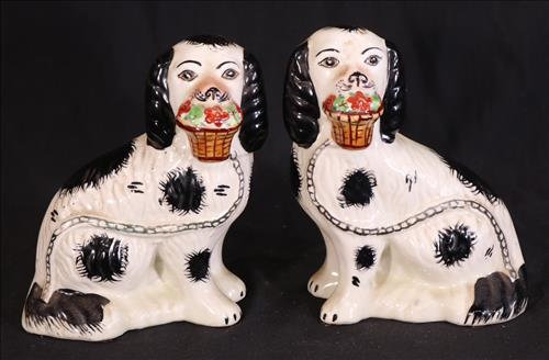 Pair of Staffordshire spaniels, 7 in. T, 5 in. W.: Pair of Staffordshire spaniels with white and black spots, 7 in. T, 5 in. W.