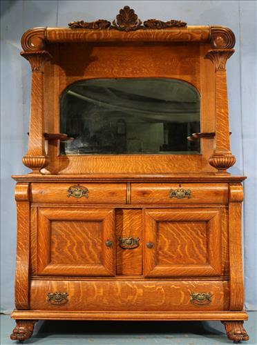 Oak quarter sawn sideboard with claw feet, 3 drawers: Oak quarter sawn sideboard with claw feet, 3 drawers, 2 doors, mirrored top and wine drawer, 82 in. T, 54 in. W, 26 in. D.