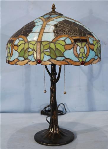 Metal lamp with stained and leaded glass shade, 23 in.: Metal lamp with blue and green stained leaded glass shade, 23 in. T.
