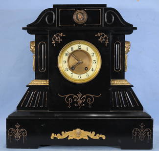 Marble Victorian mantle clock with gold trim.: Marble Victorian mantle clock with gold trim, 19 in. T, 19 in. W, 6.5 in. D.