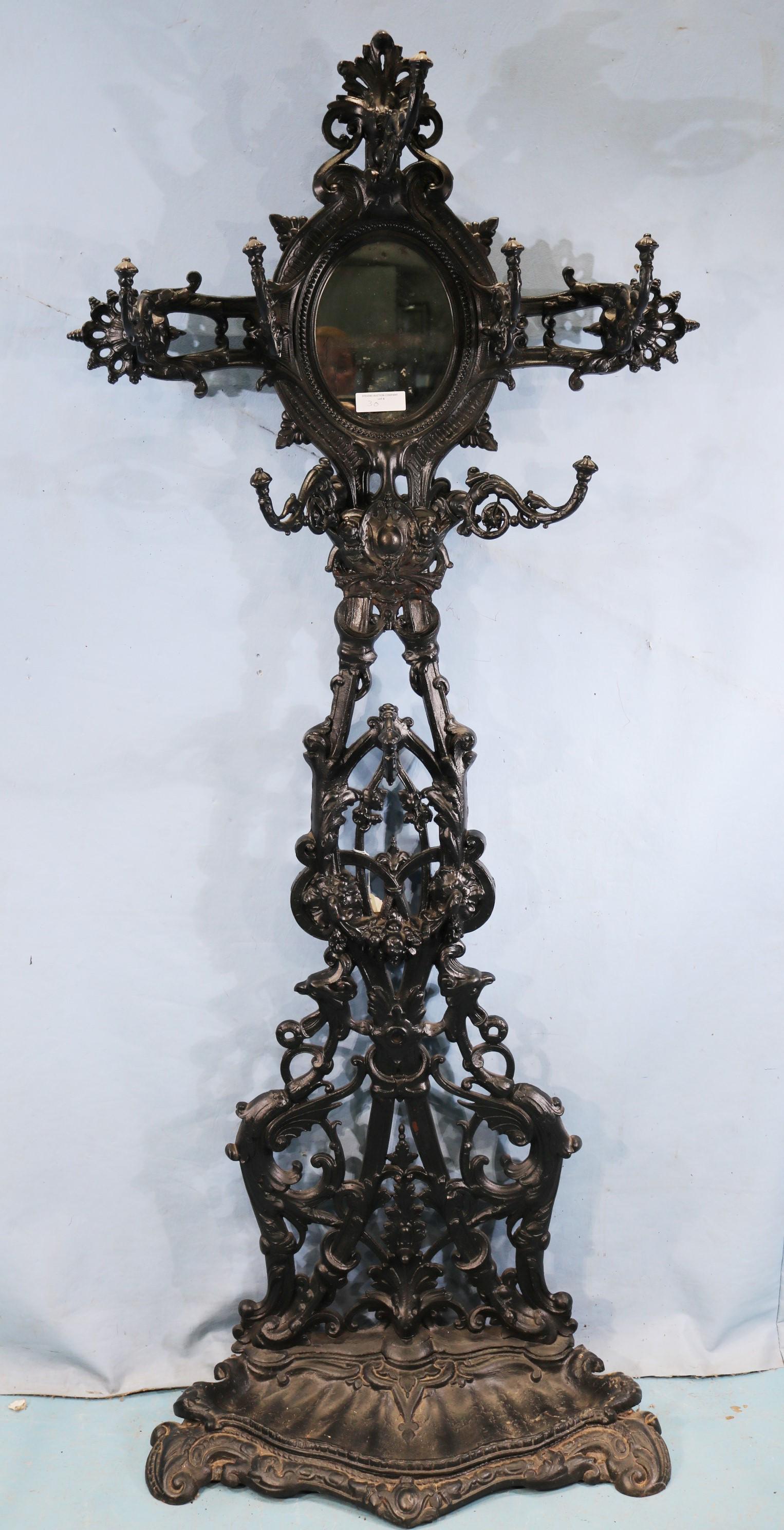 Old cast iron hall tree, all original with drip pans (0030) on Apr 09