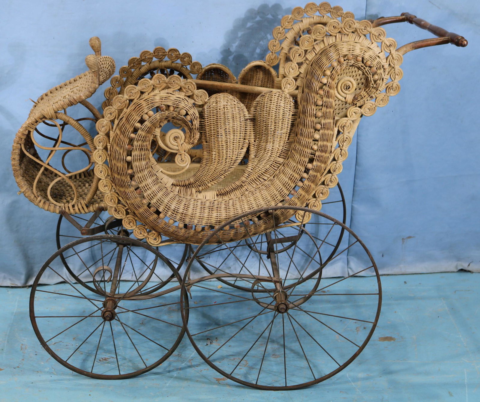 Unusual high style Victorian wicker baby buggy (1 of 5)
