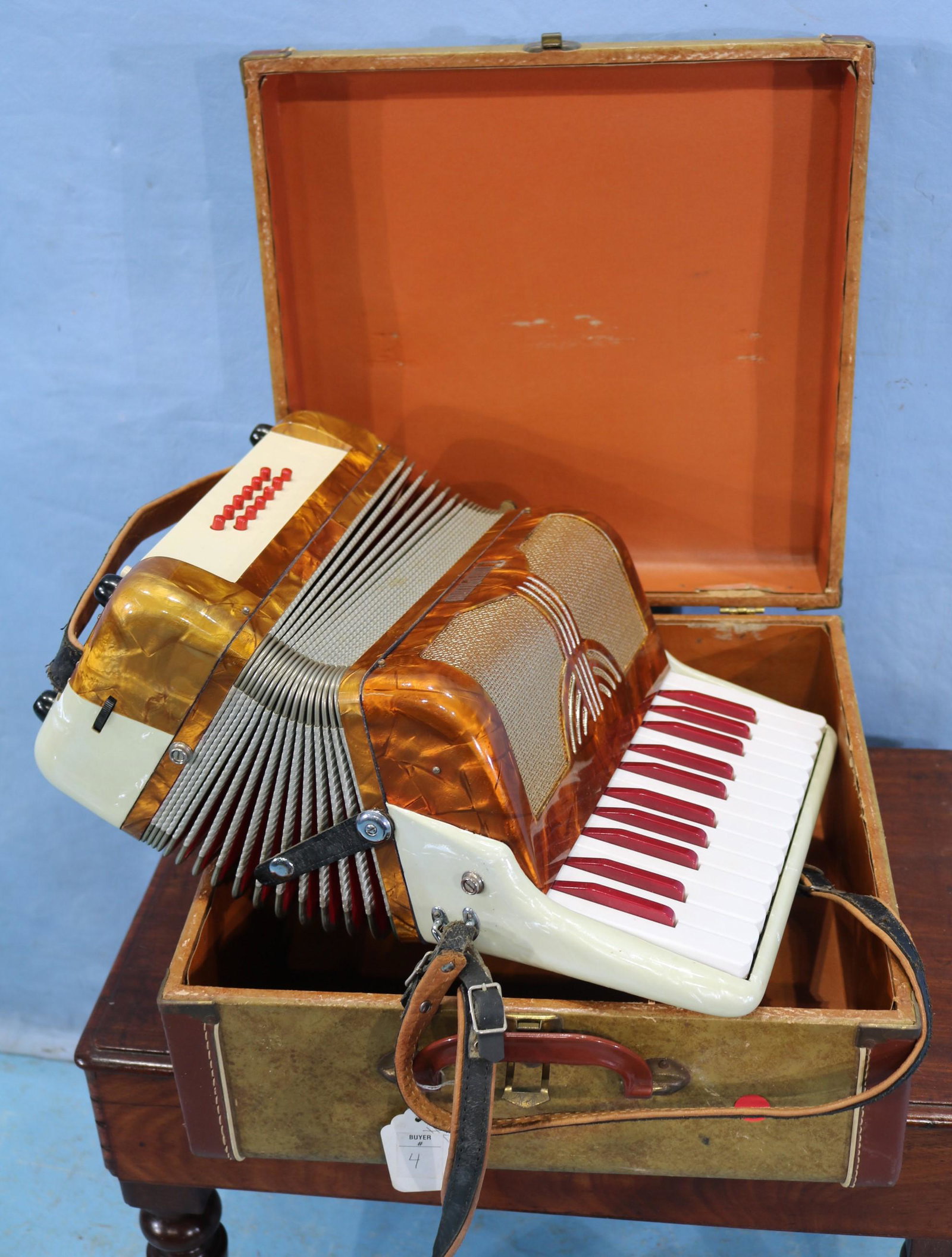 Accordion in original case, in working order, ca. 1958: Accordion in original case and in working order, ca. 1958 by Camerano, 8 in T, 15 in. D.