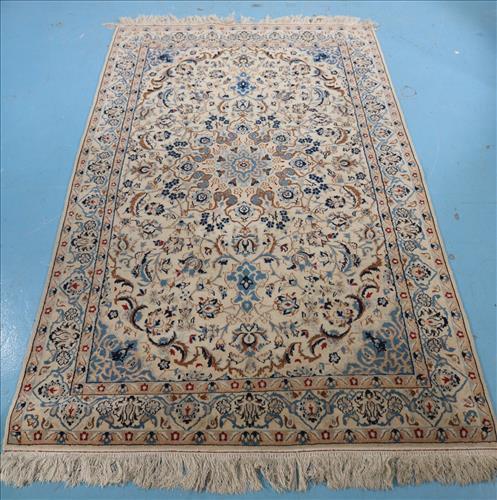 Beige and blue rug with tight knotting, 7.1 ft. x 4.5 ft.: Beige and blue area rug with very tight knotting, 7.1 ft. x 4.5 ft.