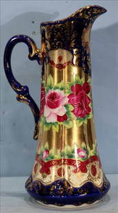 Hand painted Royal Nippon charger with painted roses: Hand painted Royal Nippon charger, painted with large red roses and good gold paint, 15 in. T, 9 in. W.