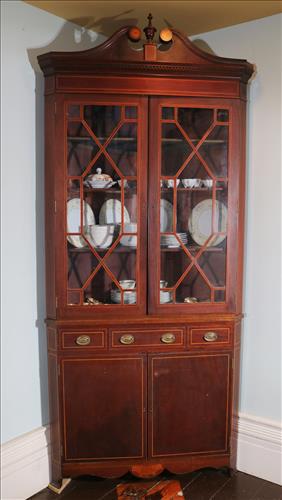 Mahogany inlaid corner cabinet with individual panes: Mahogany inlaid corner cabinet with individual glass panes, 93 in. T, 42 in. W, 18 in. D.
