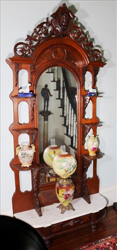 Walnut Victorian etagere with figural head on crown (1 of 7)