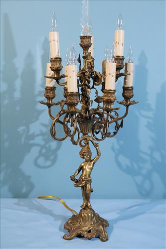 Heavy bronze figural candelabra, 28 in. T.: Heavy bronze figural candelabra, 28 in. T.