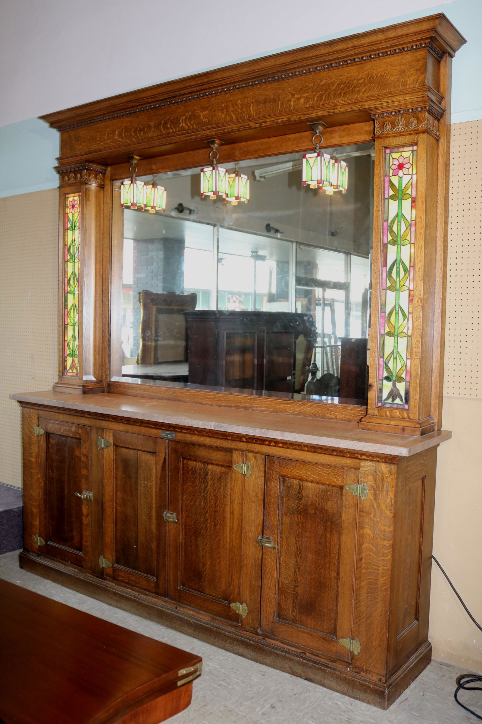 Drug store back bar with stain leaded glass side lights Nov 19, 2022