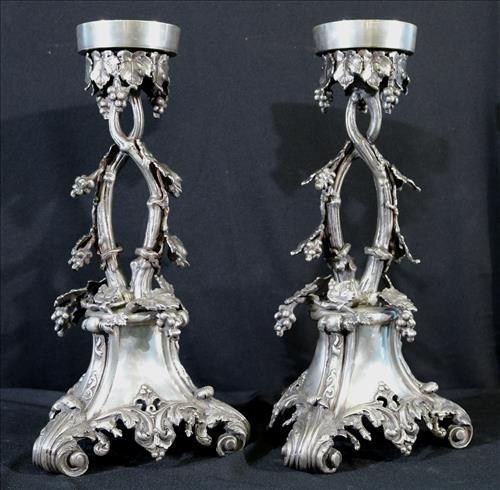 Pair of silver-plate candle sticks with grapes and leaves: Pair of silver-plate candle sticks with grapes and leaves, 17.5 in. T.