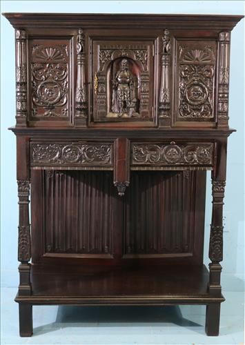 Mahogany carved English parlor cabinet: Mahogany English parlor cabinet, heavily carved with 2 drawers, good condition, 59 in. T, 39 in. W, 19 in. D.