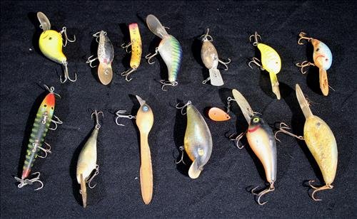 13 Old antique fishing lures belonging to Vowell's grandfather: 13 Old antique fishing lures belonging to Vowell's grandfather