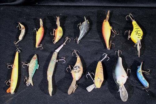 13 Old antique fishing lures belonging to Vowell's grandfather: 13 Old antique fishing lures belonging to Vowell's grandfather